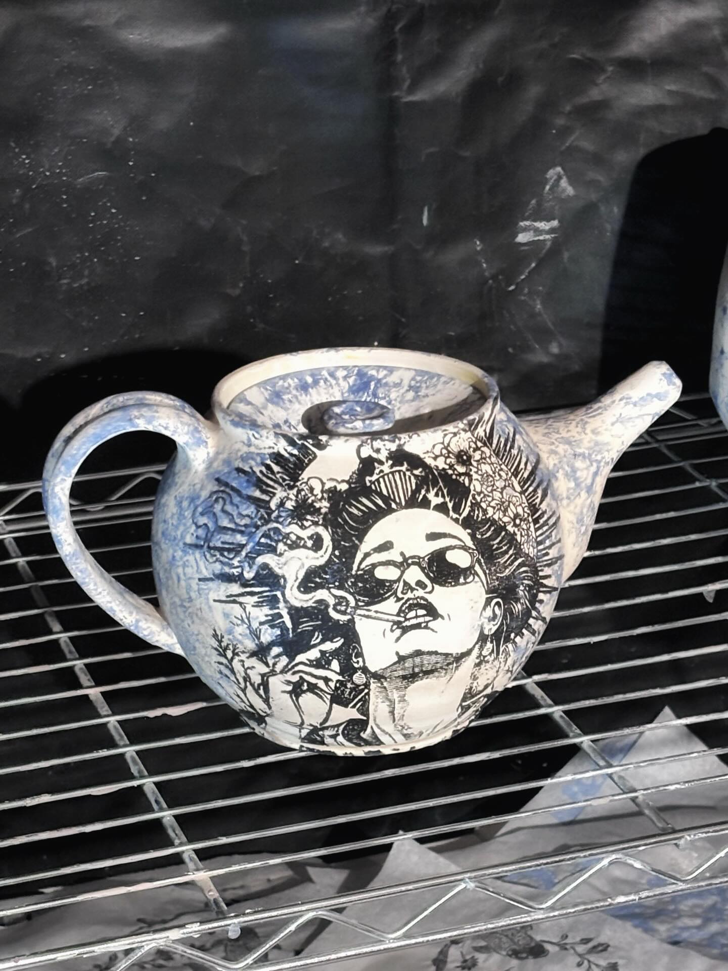 unfired…. i’m really on the fence about this teapot. i’m all in now tho….