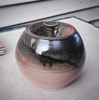 i was just messing around. i thought this glaze was going to be stupid and almost washed it off to start over. it almost looks marbled! this is a wow for me. glaze magic.