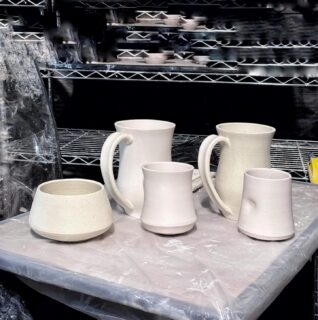 my polar ice test pieces are thrown an assembled, time to dry. very slowly i am warned. fussy stuff that porcelain. i think i got enough thinny ness going on for the light tricks.

I added yellow mason stain and spec to one. the spec made is really crappy to trim.

feels like getting to know clay all over again. 
i tried to do some new shapes, and it kept me in my lane. fussy stuff.