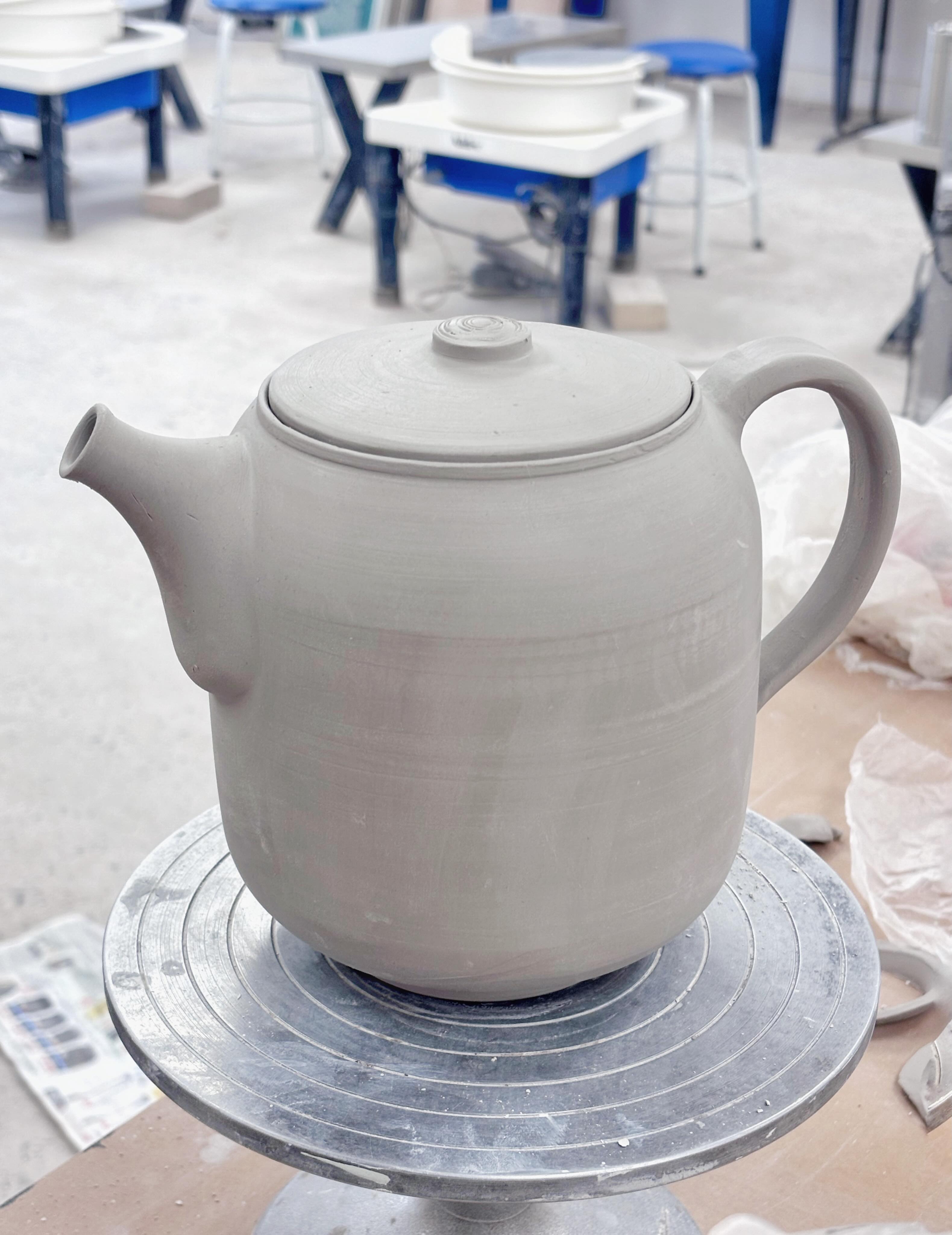 Still drying, still needs the fancier parts, but the shape is there now. This is the stage I like most sometimes.
More to come when the extra bits are on.
#pottery #ceramics #teapot #wheelthrown #workinprogress