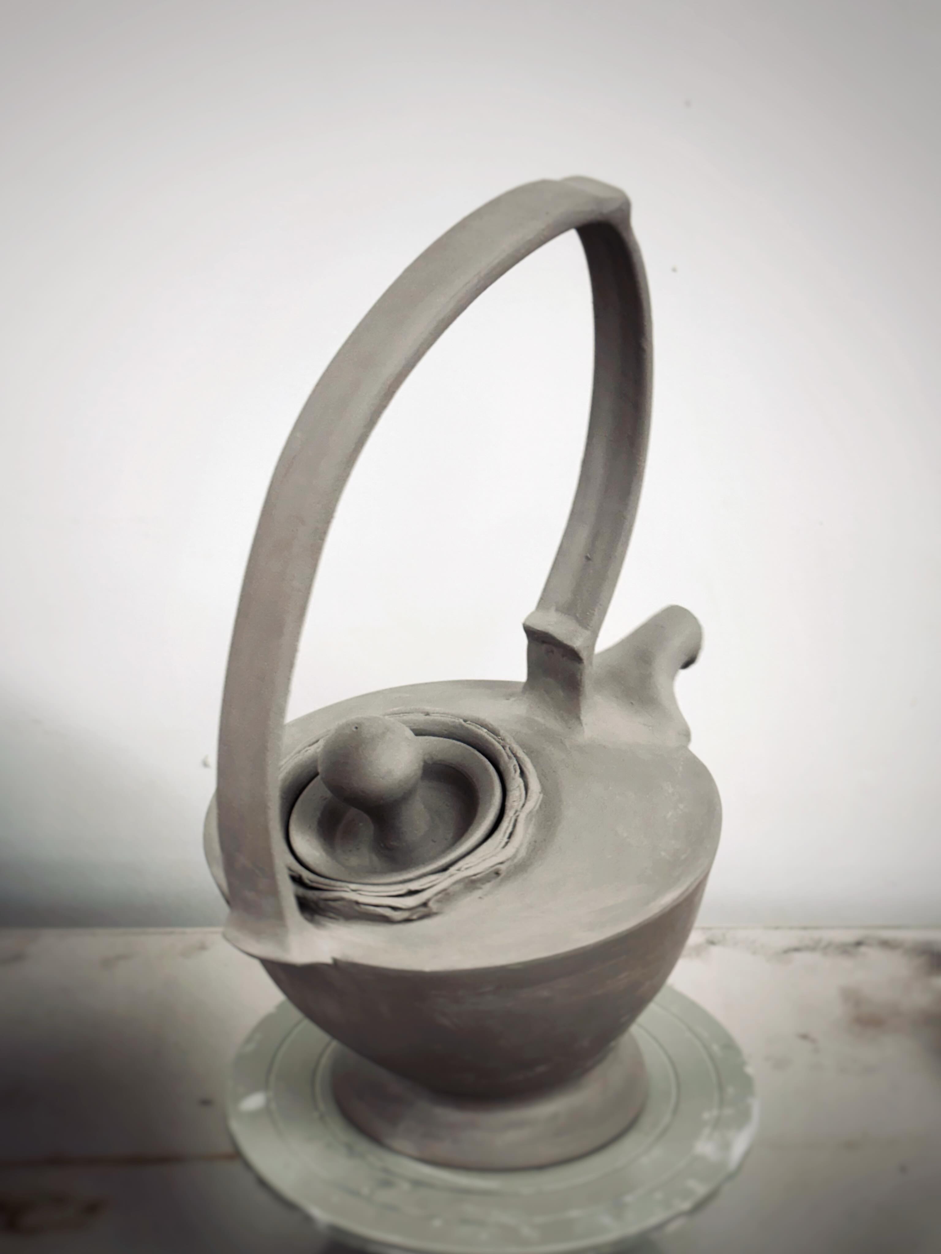 I tried to copy one of the pots that @jackietalmeylennon made recently.
i think i got close. deffinatly precarious things happening. Im still not sure how i can take the ideas and make them my own yet, but i did some things i havent done before. this was deff a push on my skill limits. lots of new things for me.
the ridiculous handle and offset lid are my favourite parts.
I might still do some carving. depends if i trust that handle.
this was a really cool learning experience.
#teapot
#ceramicteapot
#handbuiltceramics
#contemporaryceramics
potterylove